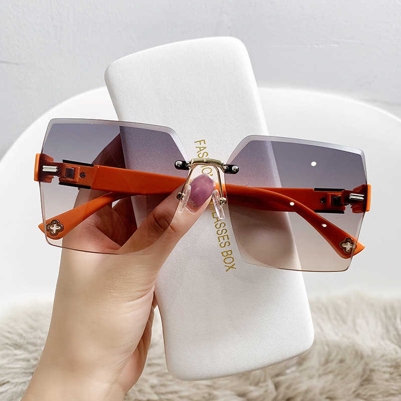 

Sunglasses Frames The same high-end women's glasses Fashion rimless cut edge Korean version Large frame beach sunglasses Summer