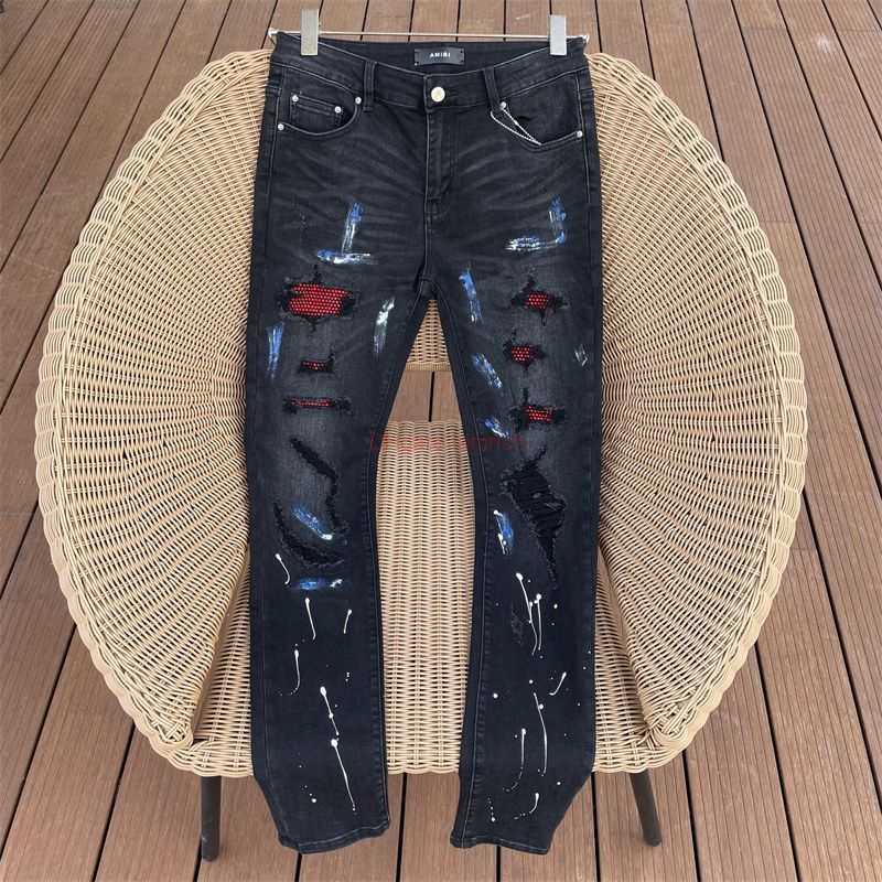 

Designer Clothing Amires Jeans Denim Pants Amies Black Paint Graffiti Inlaid with Red Diamond Stretch Jeans High Street Torn Mens Womens Long Pants Distressed Rippe