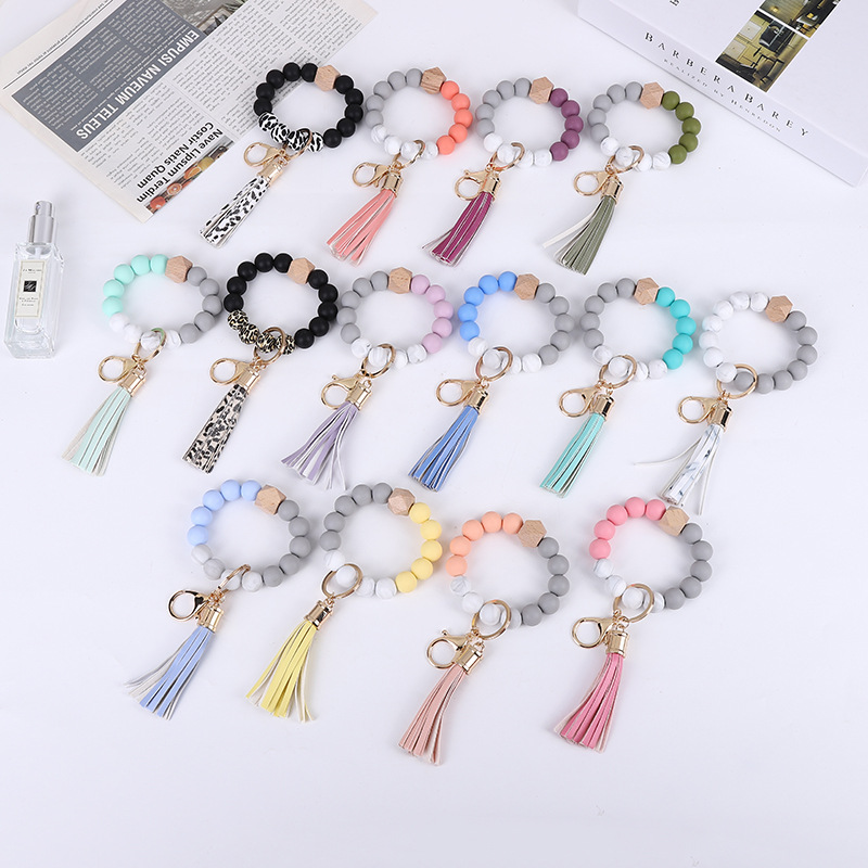 

Beaded Strands Keyring Women Leather Tassel Bangle Key Chain Wooden Silicone Bead Wristlet Keychain Party Favor