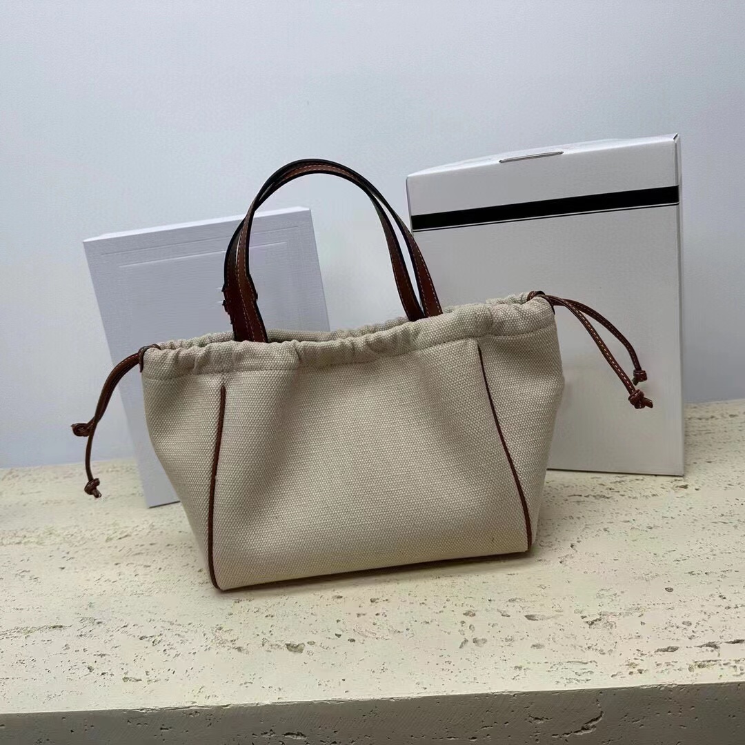 

2023 New Summer Women's Fashion Woven Vegetable Basket Bag Straw Bucket Bag Luxury Fashion Handbag Shoulder Messenger Bags, Ivory
