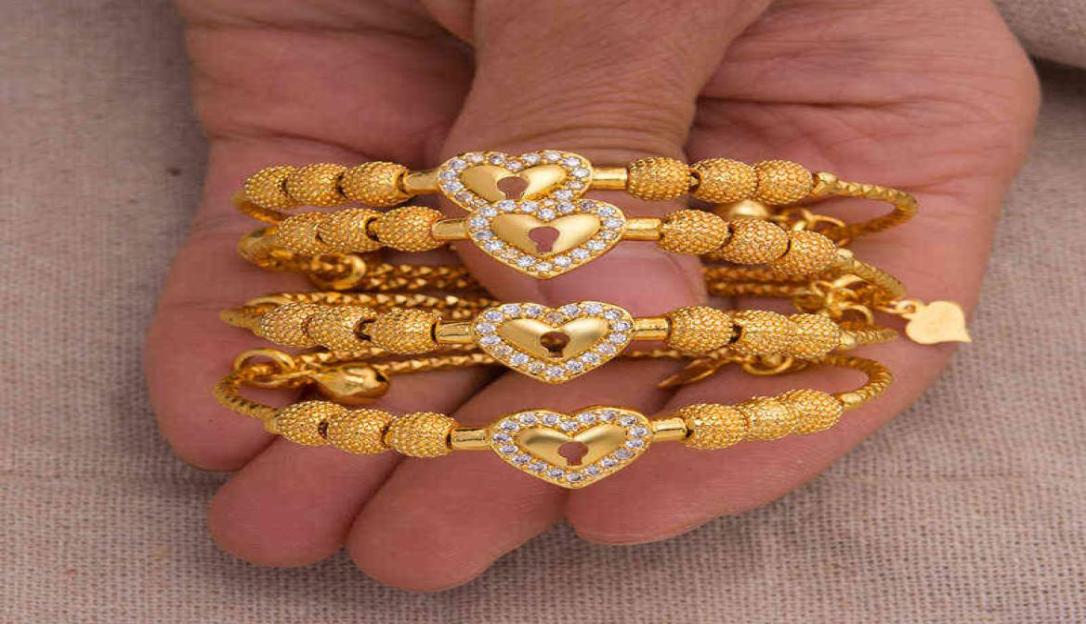 

4pcslot Baby Bangles Gold Color Boy Girls Chind Zircon Child Bangle Bracelet Festival Birthday Gift8672322