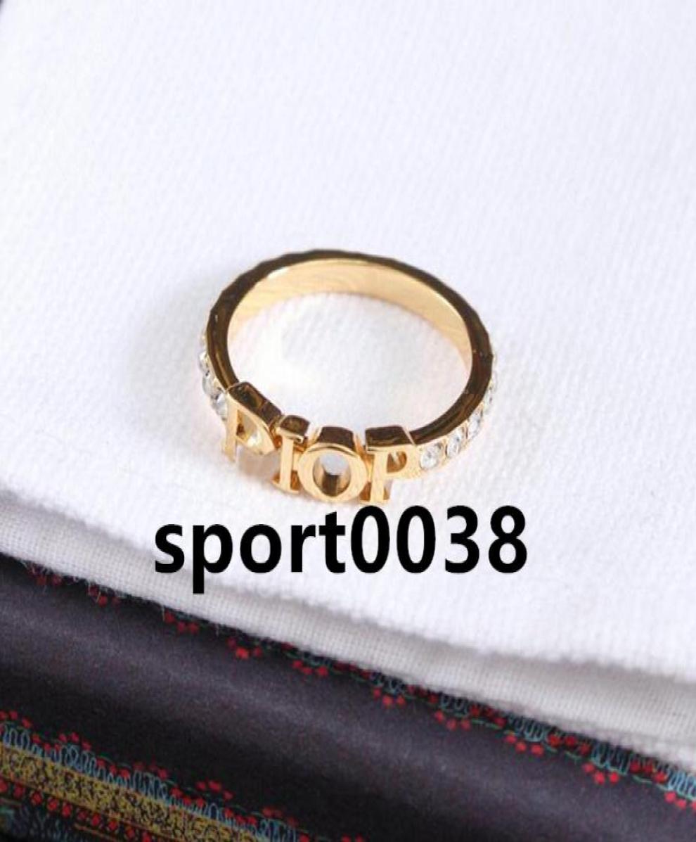 

Fashion designer gold letter band rings bague for lady women Party wedding lovers gift engagement jewelry With BOX2243672