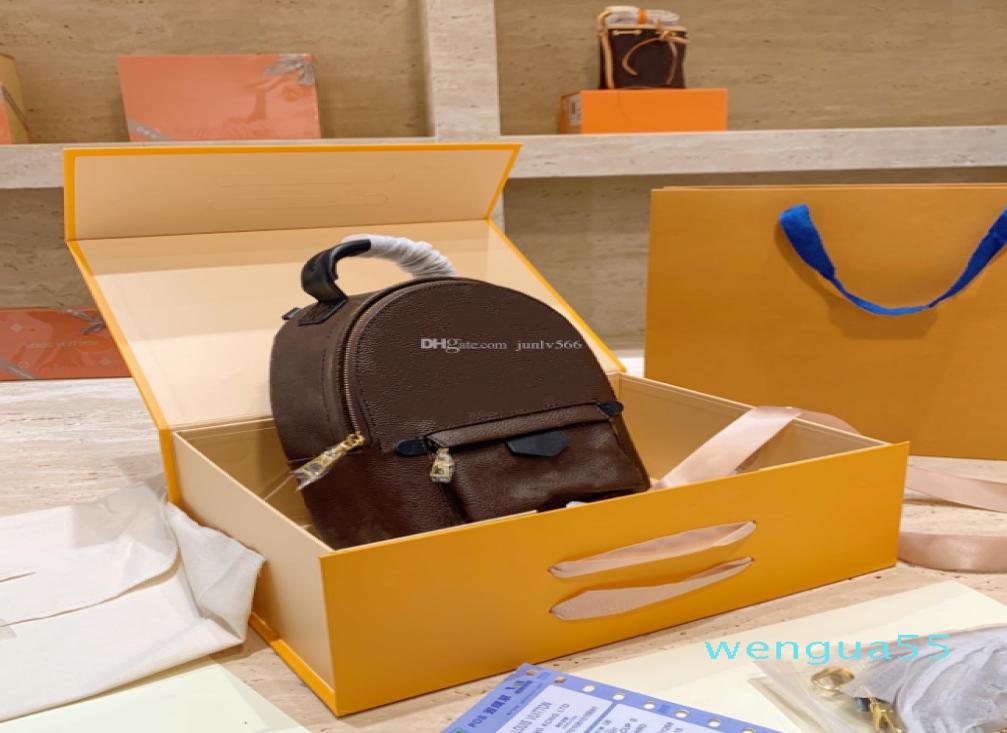 

Fashion Smooth Zipper Mini Backpack Genuine leather children backpack women Brown printing backpack7388031, Sky blue