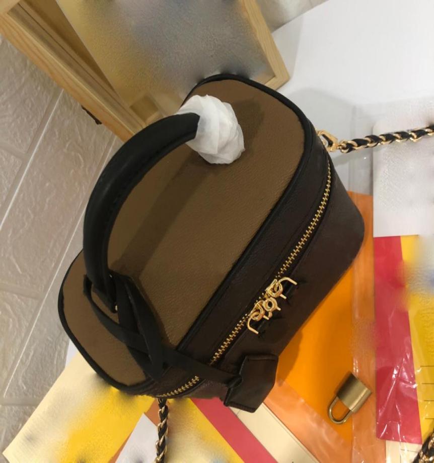 

Small handbag cosmetic bag designer canvas whether handheld or fastened with leather chain straps to achieve over the shoulder or4888626, Pink