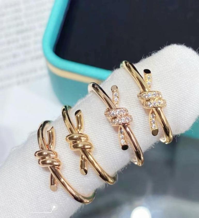 

18K gold knot ring fashion designer ring men and women wedding gift factory whole and retail2273534