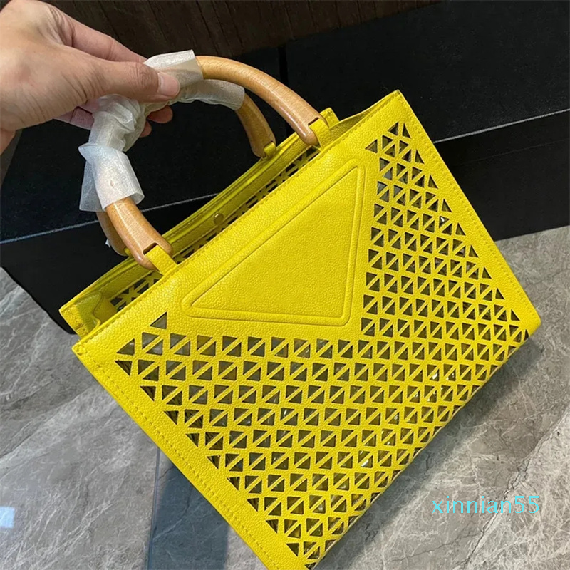

2023 New designer Women handbag Shopping Bag Shoulder Bags Hollow Out Purse Ladies Summer Travel Beach Handbags fashion versatile, Black