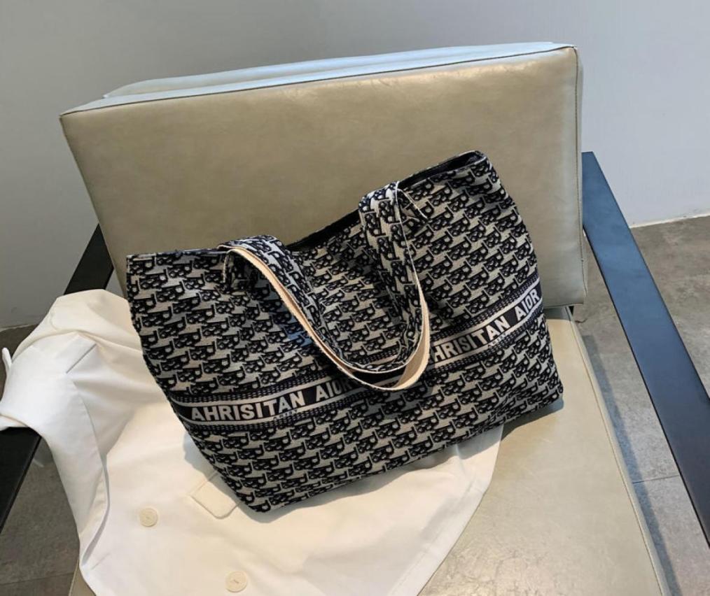 

Daily Bagins Super Popular 2021 New Embroidered Large Capacity Shopping Bag Handbag Versatile Travel Shoulder Bag Canvas Big Bag1807885, Black