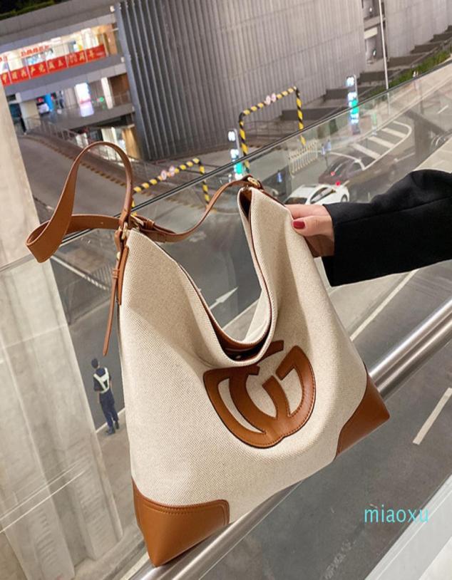 

Designer handbags Large capacity women039s summer 2021 autumn and winter new fashion canvas single shoulder bag commuter portab5973110, Cream