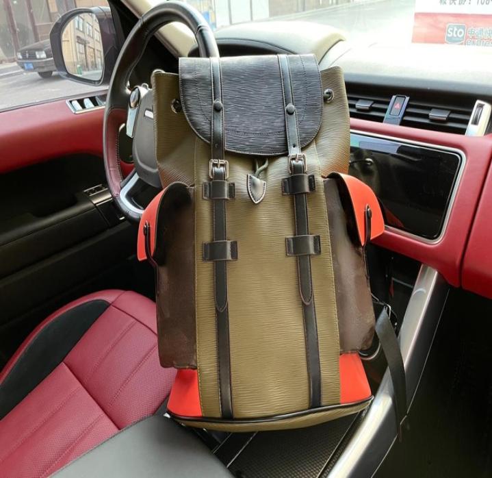 

Leather mountaineering backpack trimmed modern oversized everyday utility Large capacity pockets on both sides CHRISTOPHER6572916, Army green