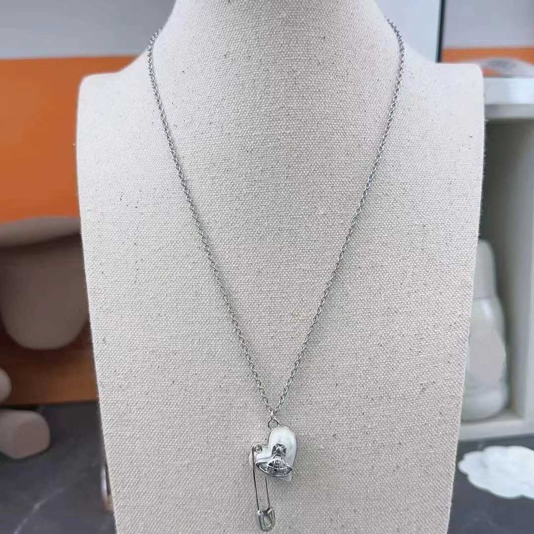 

New 2023 Saturn Peach Heart Pin Imitation Pearl Necklace by Empress Dowager Vivian