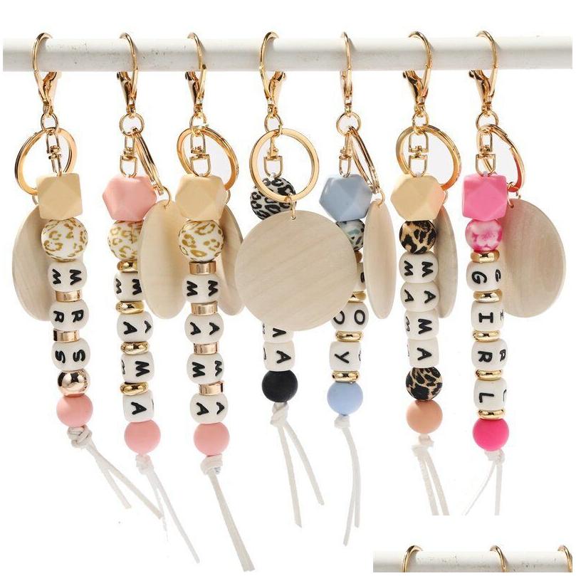 

Keychains Lanyards Diy Wood Chip Beaded Keychain Leopard Sile Beads Letter Keyring Mama Mothers Day Gift Drop Delivery Fashion Acce Dhghx