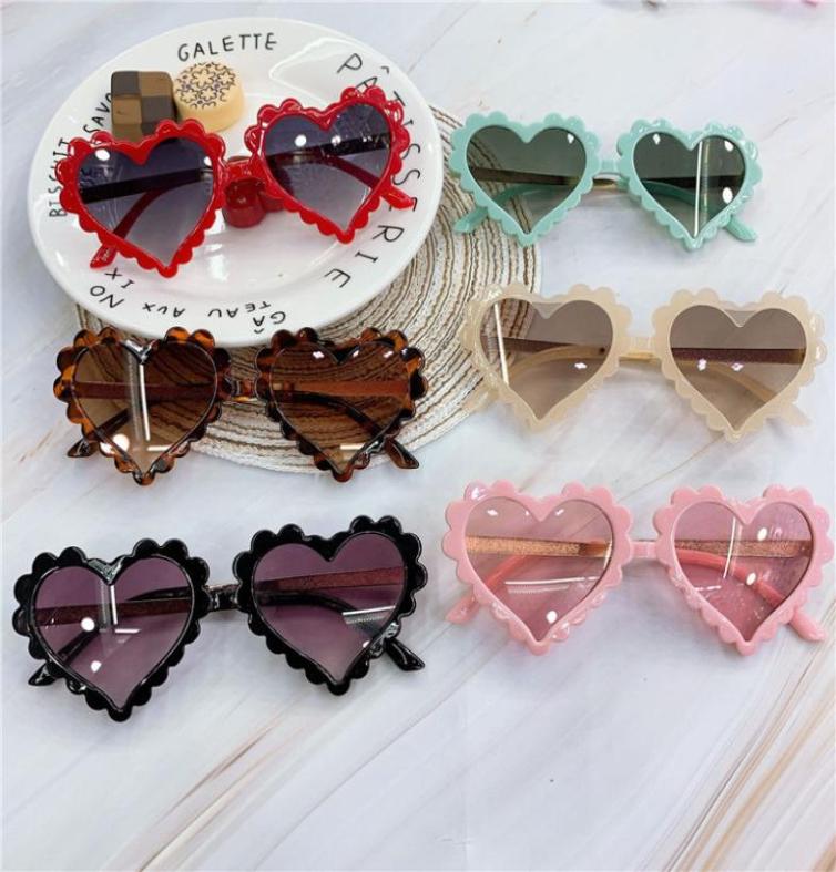 

Whole 2020 Cute Love Kids Sunglasses Children Fashion Plastic Heart Sunglasses Baby UV400 Sun Glasses for Girls Boys Oculos7919858