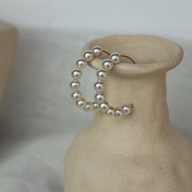 

wrapped pearl temperament earrings simple earrings hollowed out large circle earrings elegant style