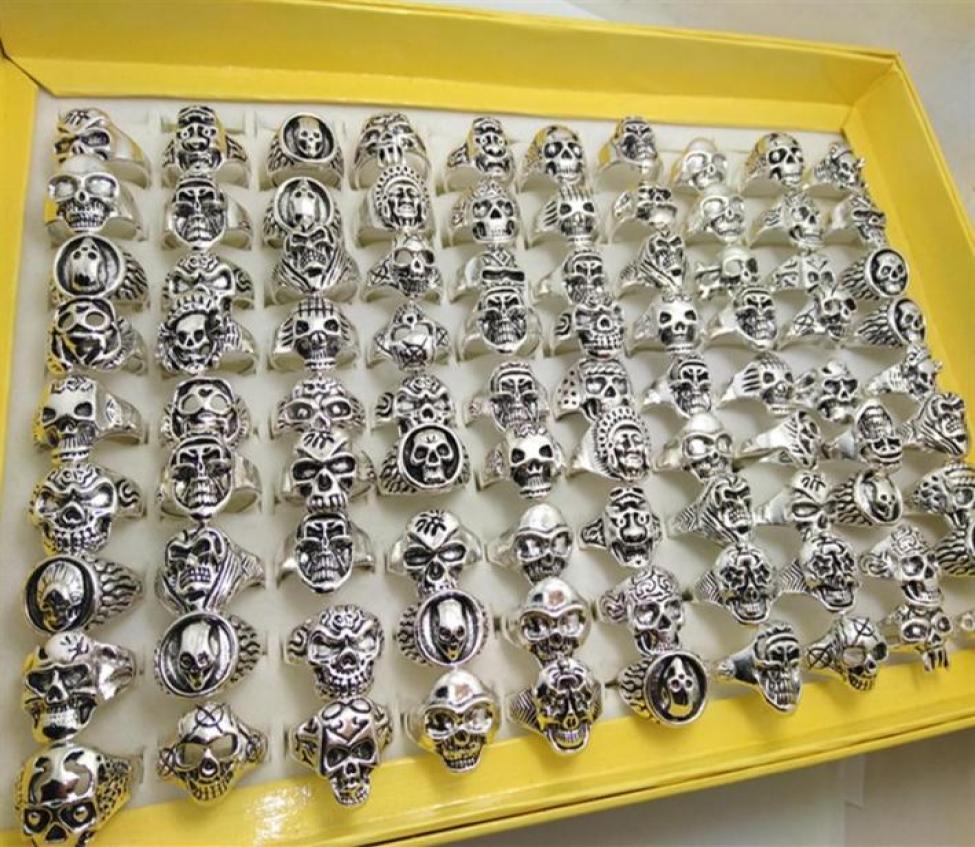 

Whole bulk lot 100pcs Styles Top Mix Skull Rings Skeleton Jewelry Men039s Gift Party Favor Men Biker Rings man jewelry BRAND NE9953895