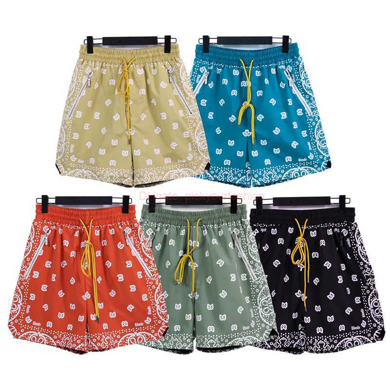 

Designer Short Fashion Casual Clothing Beach shorts Rhude High Street Fashion Brand Personalized Cashew Nut Printing Shorts Summer New Loose Mens Womens Casual Spo, Black 1