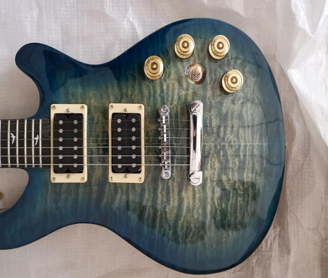 

Custom Shop Paul Reed Blue Dragon039s Breath Quilted Maple Top Electric Guitar Flame Maple Neck Tremolo Bridge Natural Bindin3229093
