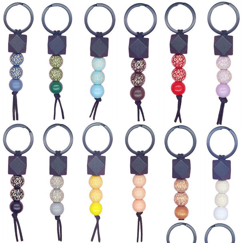 

Keychains Lanyards Leopard Beaded Wooden Bead Keychain Pendant Diy Lage Decoration Key Chain Keyring Drop Delivery Fashion Accessor Dhdpe