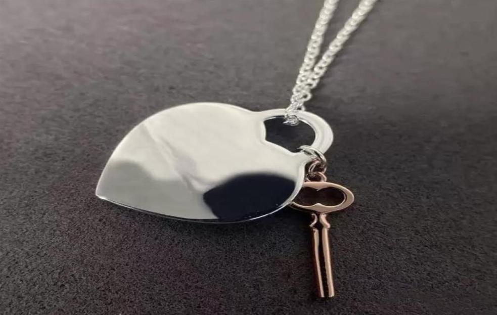 

Top Quality Lady Pendant Necklace Women Designer Necklace Luxurys Designers Jewelry Heart Key Gold Silver Love Mens Gift D217314FF5497241