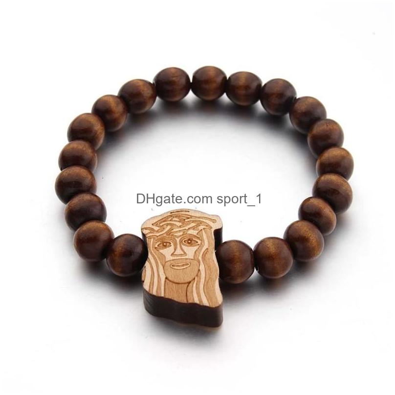 

Beaded Strand 10Mm Cool Elastic Round Wood Bead Engraved Diy Ethnic Chain African Map Bird Panda Jesus Bracelet Jewelry Hiphop Gift Dhszf