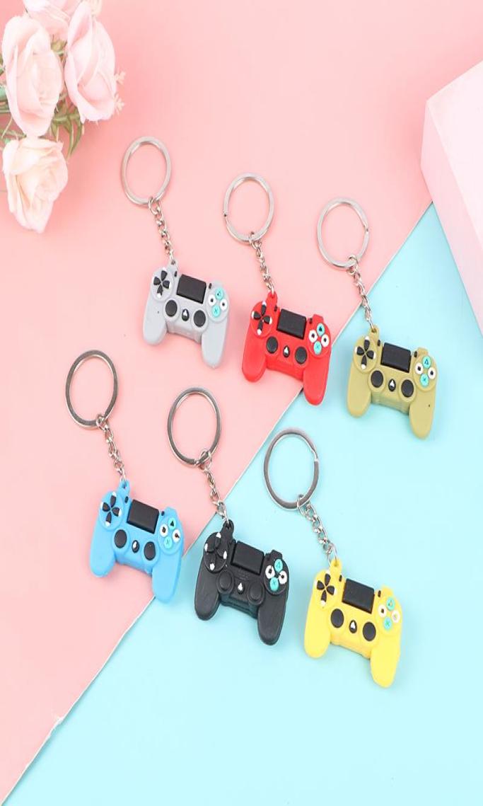 

Keychains Creative Personality Simulation Game Keychain Ring Pendant Couple Key Chain Machine Car Bag Charm7861823