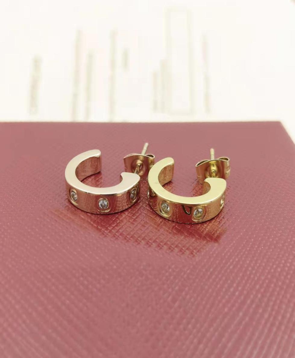 

Designer fashion earrings huggie Love earrings titanium steel electroplated 18K gold rose silver durable high quality colourless g1338265