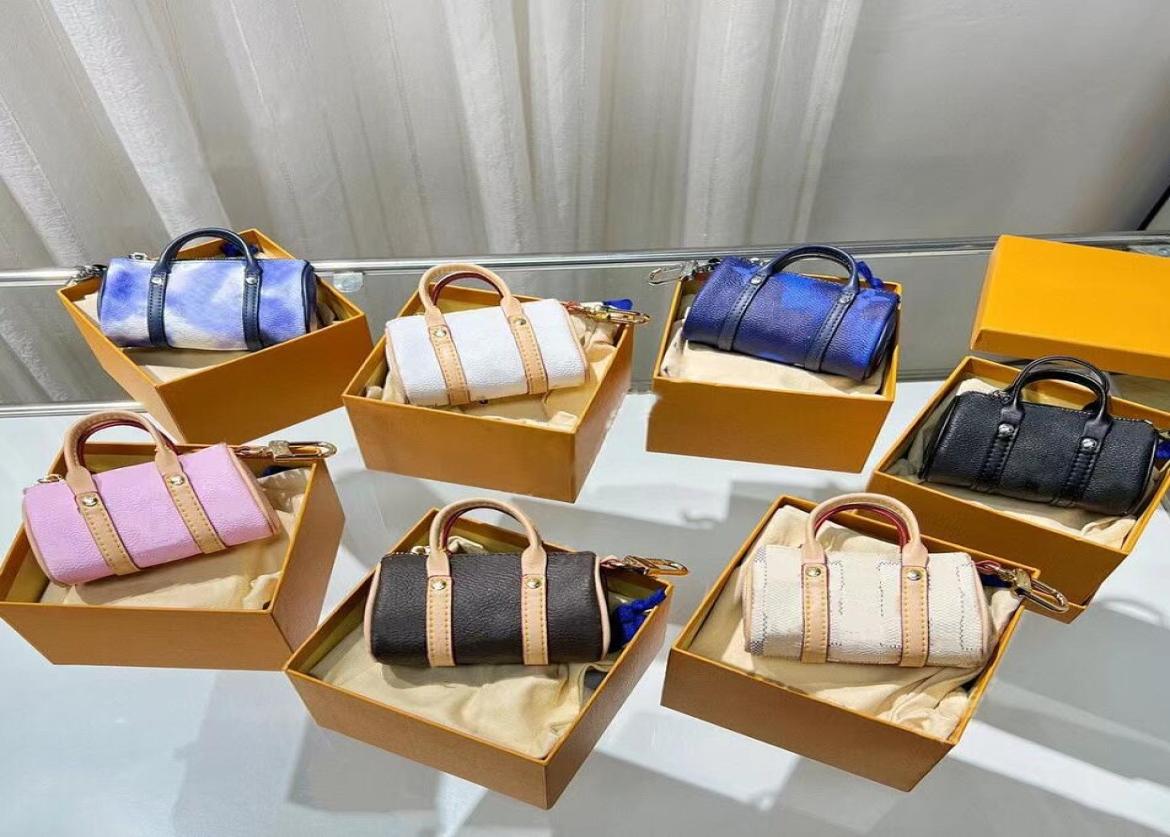 

Classics Printing Women Keychains Luxury Leather Change Purse Designer Mini Shell Bag Pendant Accessories Couples Backpack Coin Pu1732286