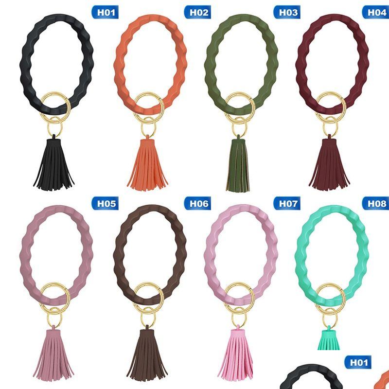 

Keychains Lanyards Fashion Silica Gel Bracelets With Tassel Pendant Portable Solid Color Round Sile Keyring For Women Trendy Wrist Dhs0L
