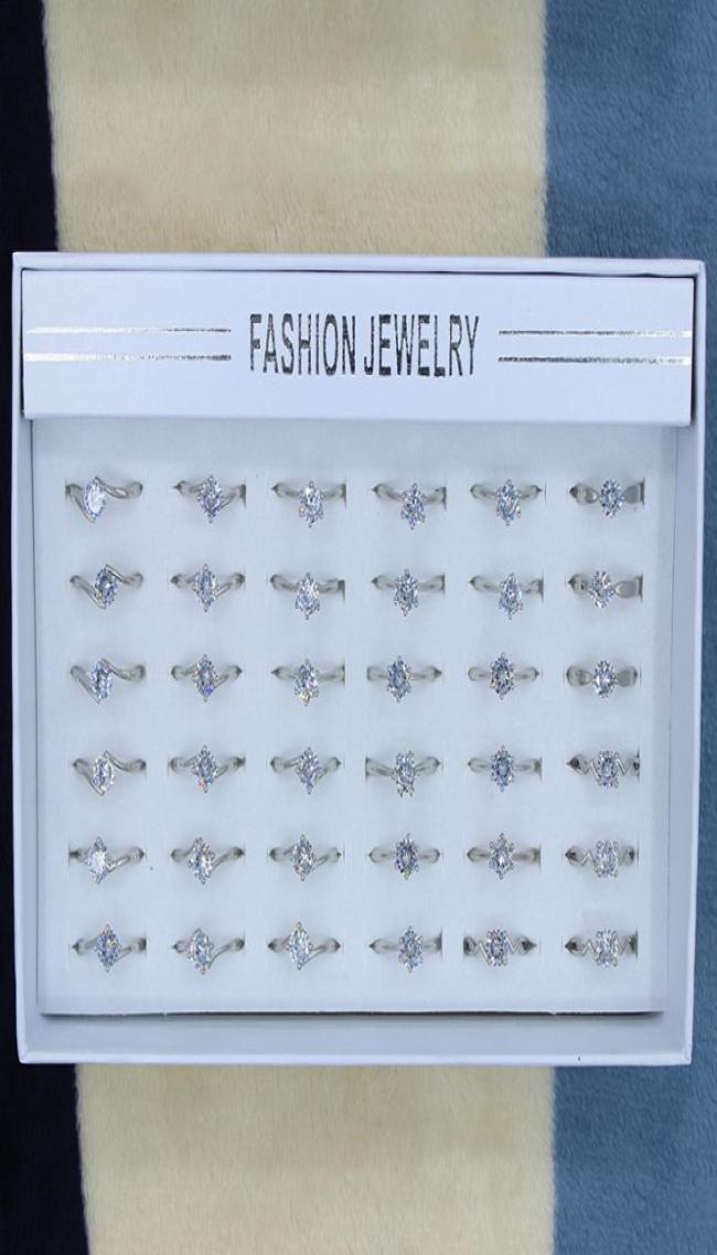 

SIQIJIU New Whole 100PCs Mixed Styles Women Finger Band Rings White Gold Wedding Simple Designer Luxury Fashion Jewelry Round 5311679