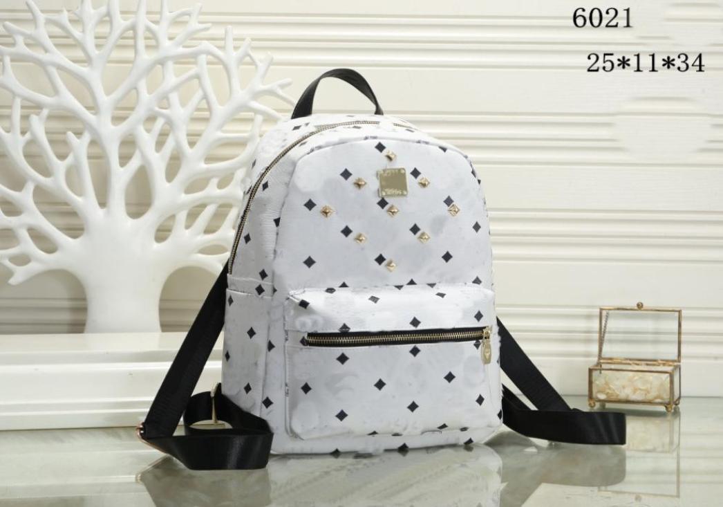 

Leather Style student travel Backpack High Quality men women rivet Backpacks famous handbag Designer Girls boys Fashion School Bag3771643, Sky blue