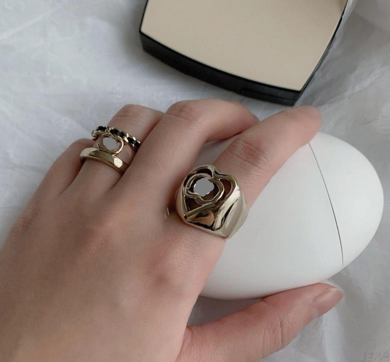 

Luxurious designer women's openwork monogram rings are stylish and versatile