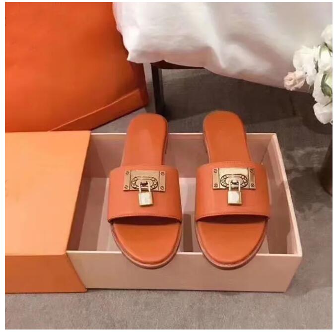 

Summer fashion woman beach slippers Leather Cartoon Big Head Slippers Flat shoes Hotel Letters woman Shoes Metal Lock head slippers