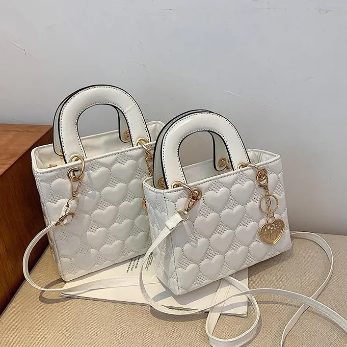 New Design Bow Princess Diana Style horizontal Diamond Lattice bag genuine Letter ring buckle pendant leather fashionable bag simple commuter hand E