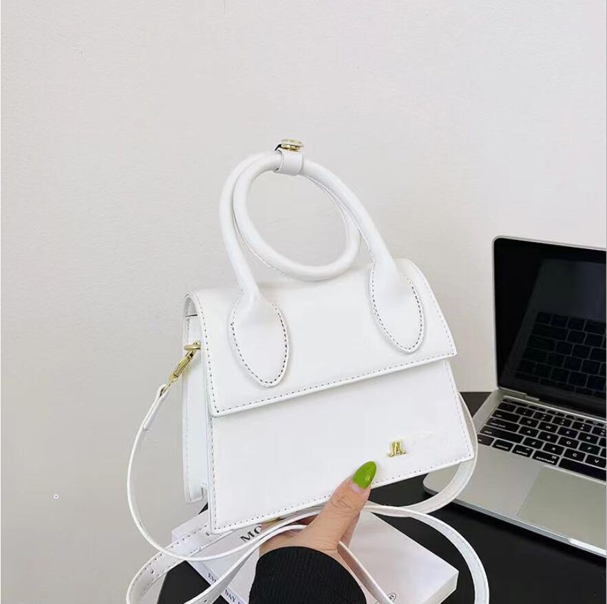 

JAQUEMUS French niche design jaquemus premium texture ins single shoulder underarm bag for women's handheld concave shaped small square bag 15.20.7cm 23, White