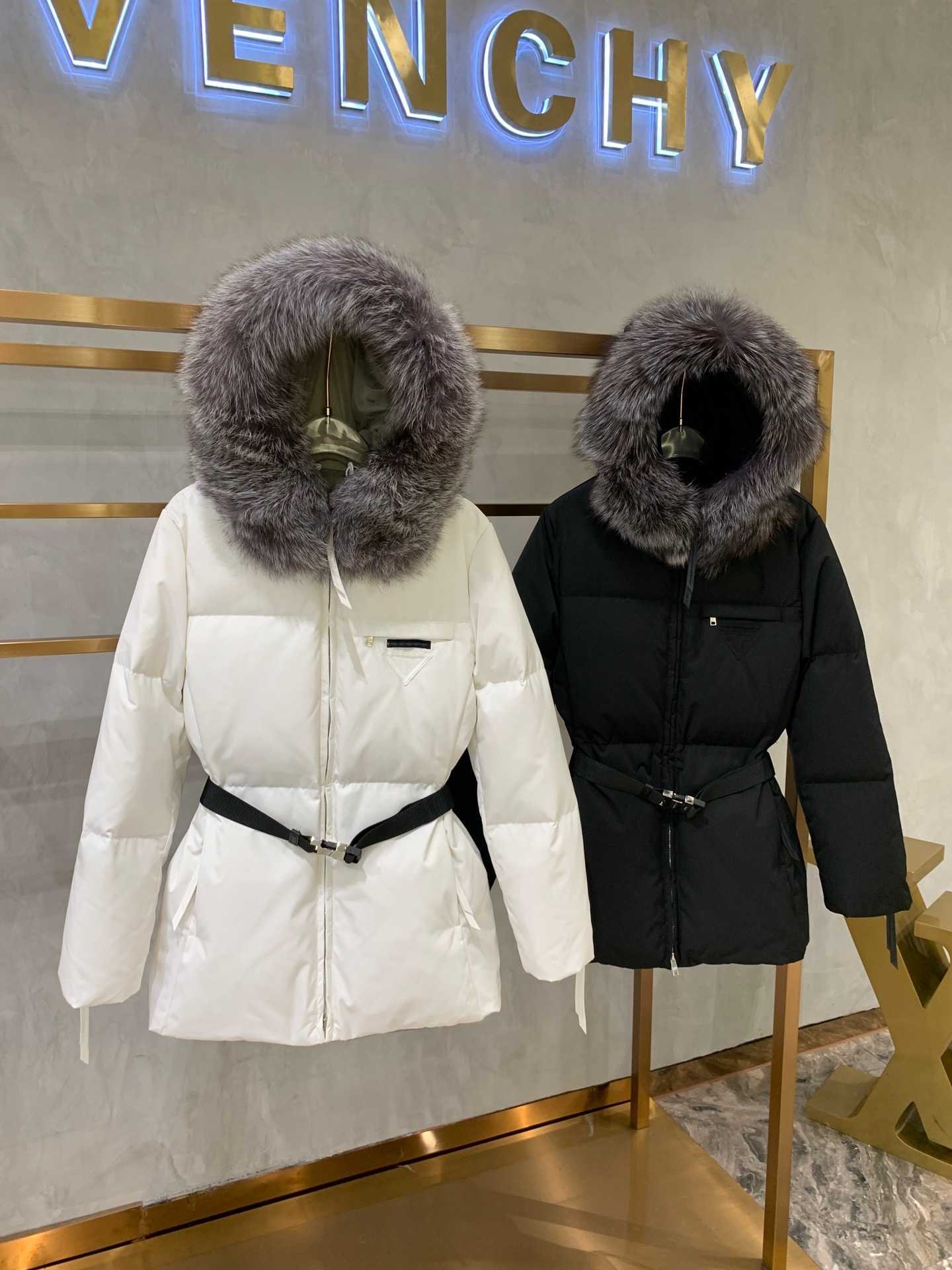

Winter fox big hair collar waist ladies down jacket, white duck down filled with belt, waist slimming, import surface to oh wind and waterproof.