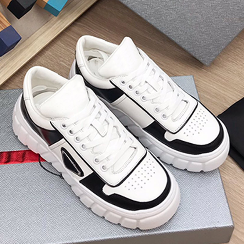 

Leather snorkers Designer Womens Casual Shoes Panda Triangle Signature Luxury Sneakers Non slip Loose Soles Skate shoe Vintage Outdoor Mens Sneakers