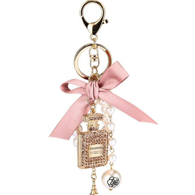 

Fashion Imitation Pearl Perfume Bottle Keychain Car Key Ring Women Bag Charm Accessories Cute Bow Key Chain Creative Keyrings