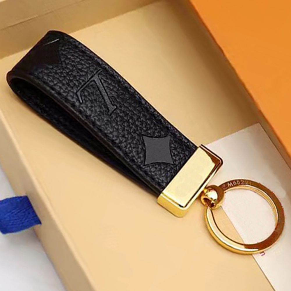 

Leather Keychain Card Holder Exquisite Luxury Designer Keyring Zinc Alloy Letter Unisex Lanyard Cute for Women Men Black White Metal Small Jewelry Accessories 19CL