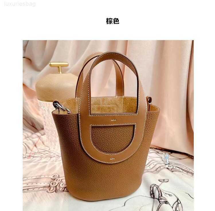 

Designer Luxury Togo Top Layer Cowhide Pig Nose Vegetable Basket Portable Bucket Large Capacity Commuter Women's BagEVWKV442 Picotin, Milkshake white