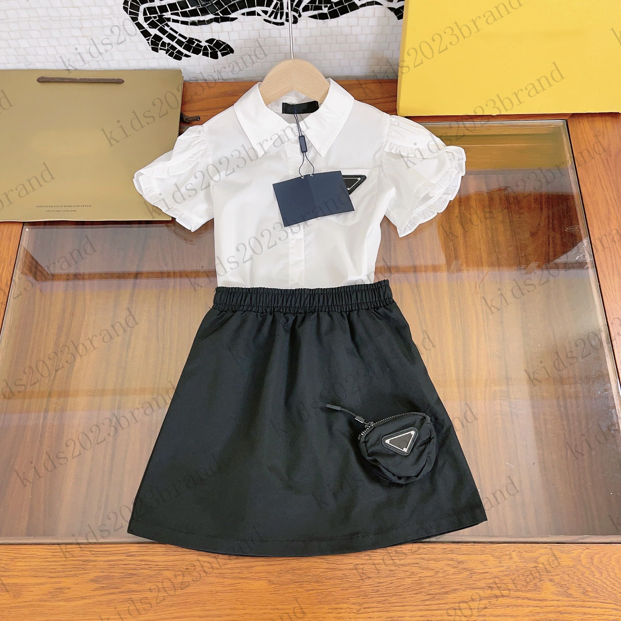 

2023 summer girls skirts sets brand designer blouse with half skirt two pieces sets Ruffled sleeves girls white shirts short pleated skirts high end children skirts, 3#