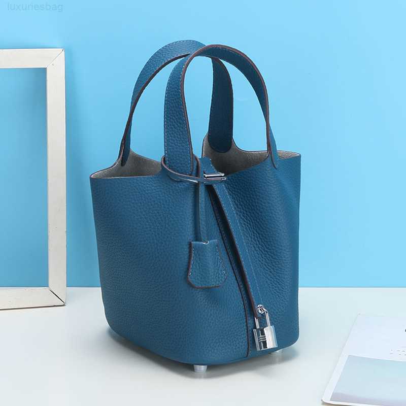 

Designer Luxury Bag Soft Top Layer Cowhide Net Red Vegetable Basket Leather Bucket Lychee Pattern Leisure Hand Female Small HandbagVRO4JW1W Picotin, Small orange