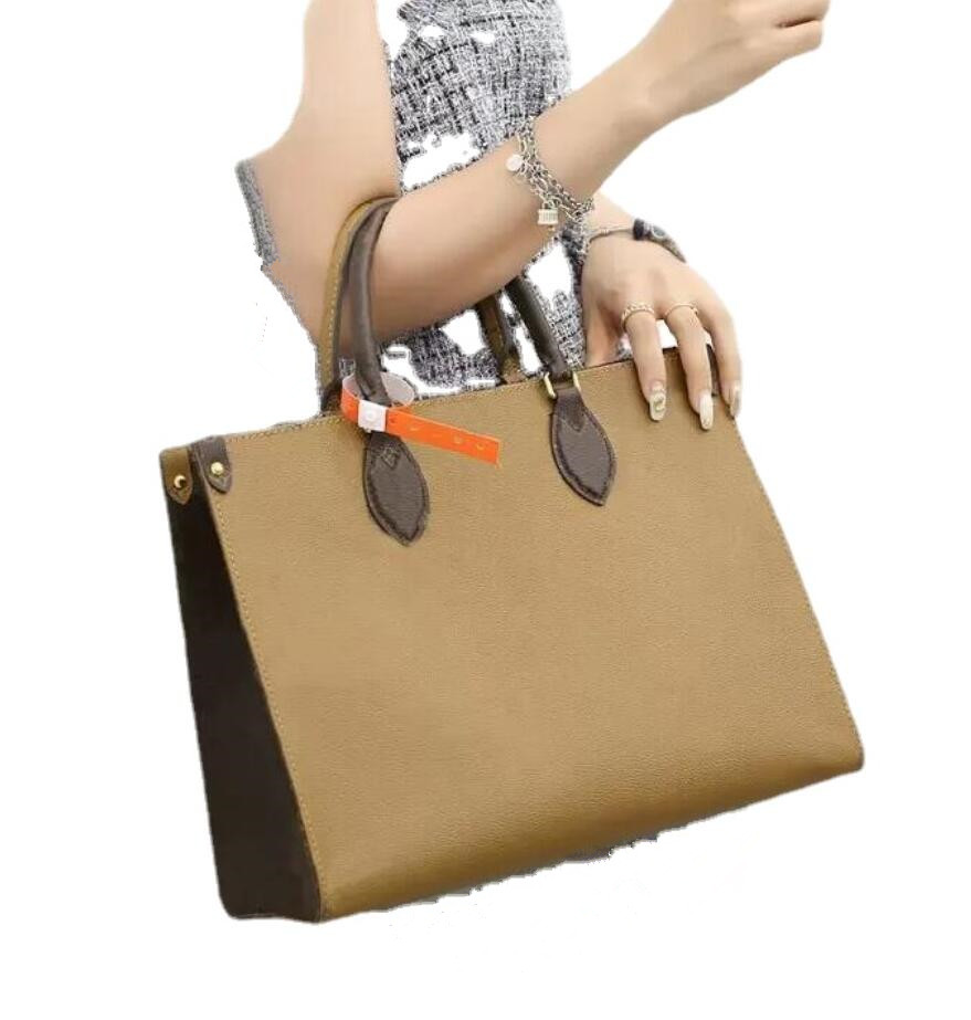 Le sac à main en cuir authentique est livré avec des sacs de chaîne WOC Box Femmes Luxurys Designers de mode sacs Femelle Classic Classic High Qu