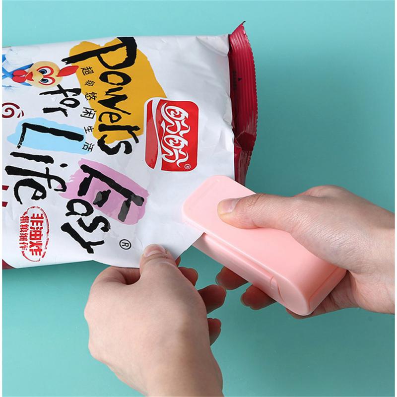 

Portable Bag Clips Heat Sealer Plastic Packaging Storage Bag Holder Mini Sealer Handy Sticker Sealer Food Snacks Kitchen Gadgets