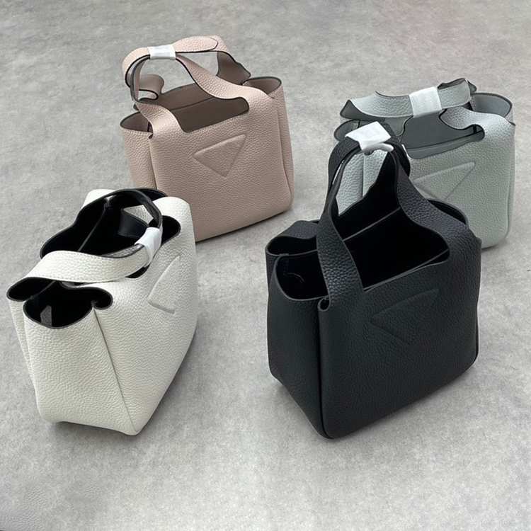 

Cowhide leather prad clutch bags Triangle Basket tote Womens Mens handbag Metal fittings Magnetic snap closure Crossbody Luxury Designer purses Open shoulder bag, White