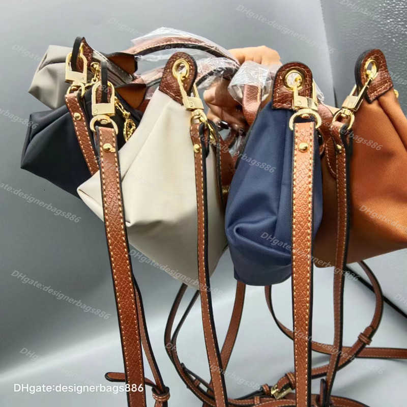 

High quality Bag luxury wallets luxury wallets Mini Single-handle Casual Dumpling Waterproof Nylon Leisure Hand Purse Hualong handbag designer purse bags, Barbie powder genuine leather