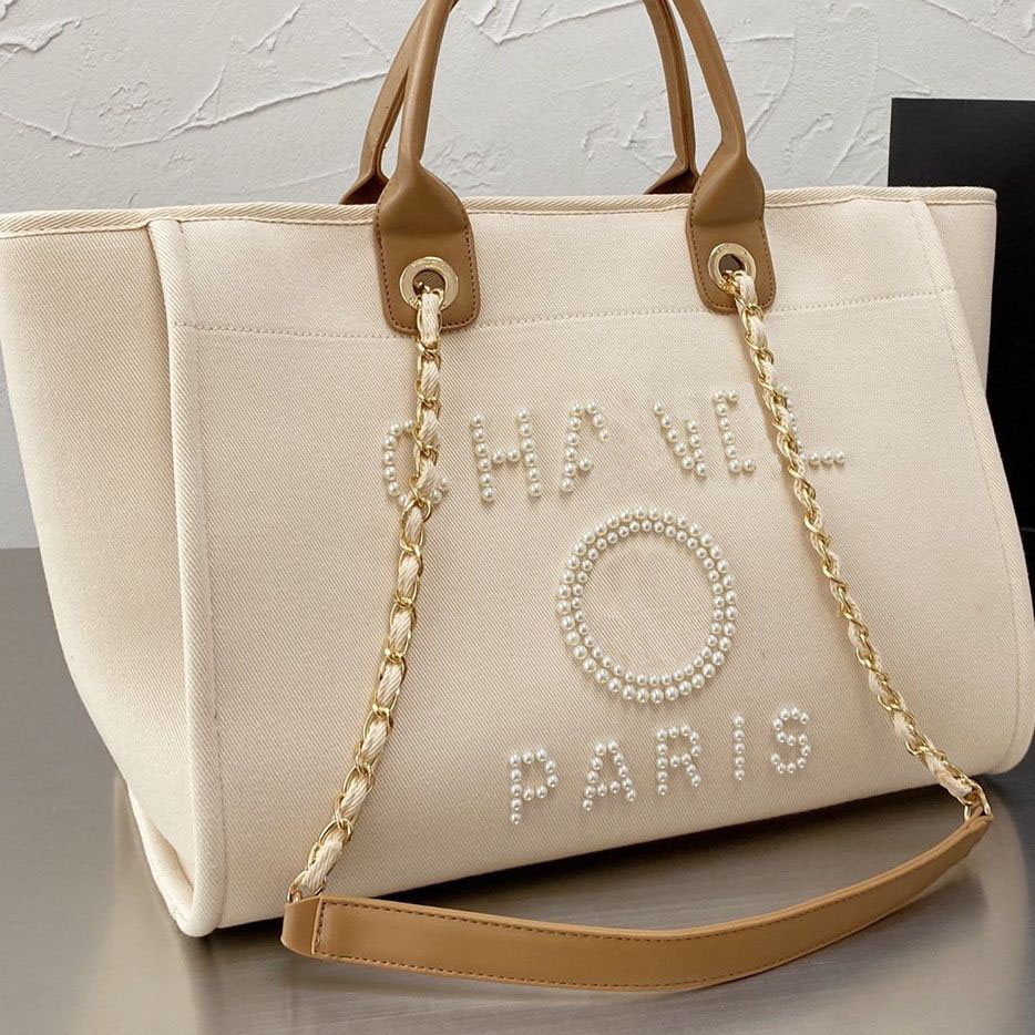 

Classic Luxury Designer Beach Bags Canvas Pearl Evening Bag Portable Shopping Large Capacity Handbag Brand Ch Women Handbags Label Backpack Ladies Satchel I0uq, Beige