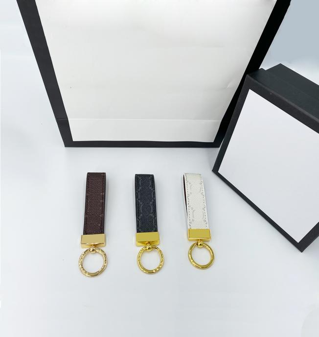 

Fashion 2022 Keychain Brand Designer Key Chain Mens Luxury Car Keyring Womens Buckle Keychains Handmade Leather Men Women Bags Pen8789876