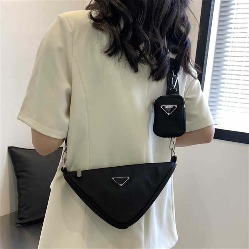 

Designer bag Oxford cloth triangle bag 2023 new internet celebrity niche design with a high-end sense of westernization one shoulder diagonal cross mini bag, Black