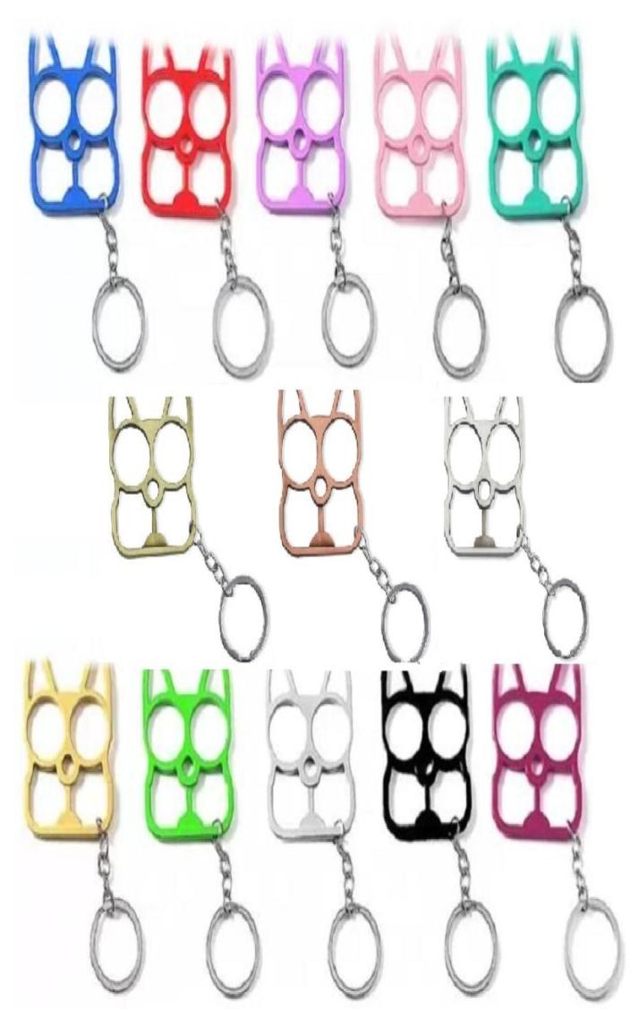 

Multifunctional Defense Cat Keychains Cartoon Cats Finger Tiger Set Two Buckle Selfdefense Broken Windows Tool Pendant Defense Ke4549120