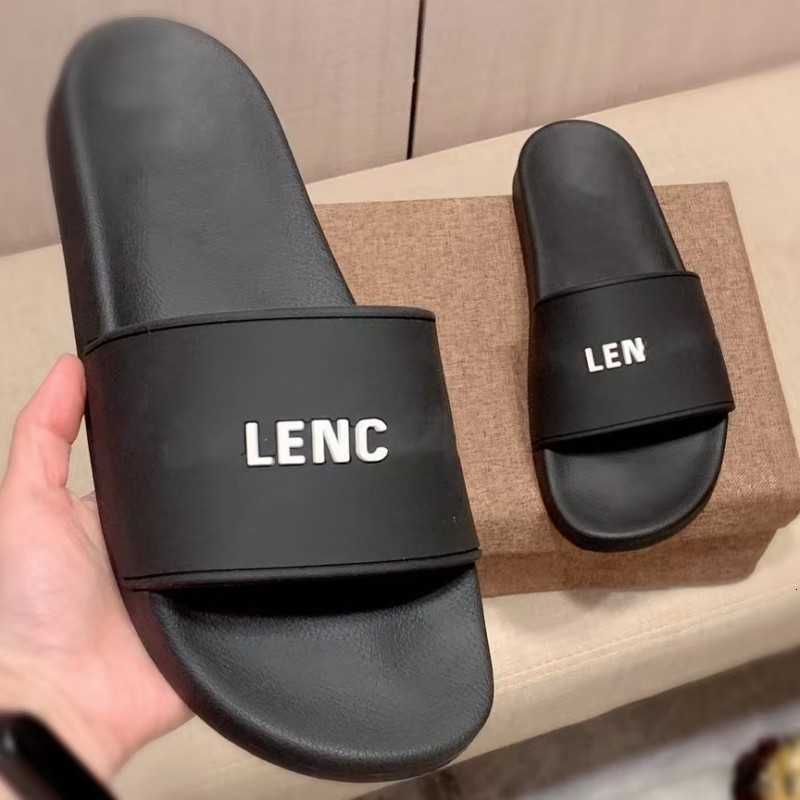 

High end letter printed black slippers 2023 summer couple's flat bottom anti slip one word slipper, White letters