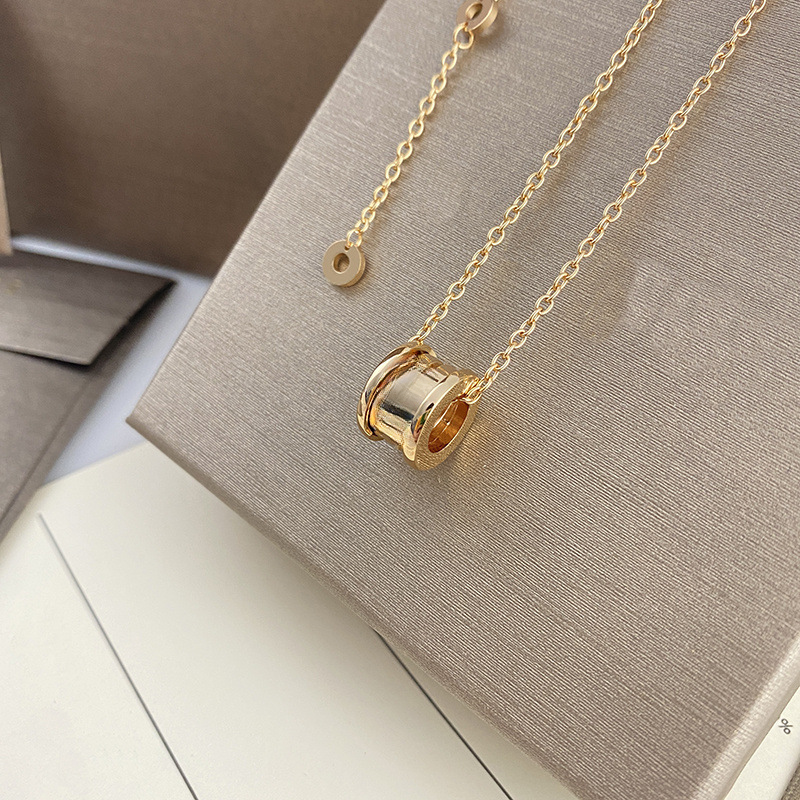 

European Necklace New Titanium Steel Necklaces Women's High-End White and Black Ceramic Spring Pendant